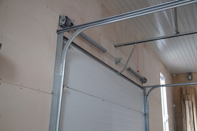 garage door roller off track