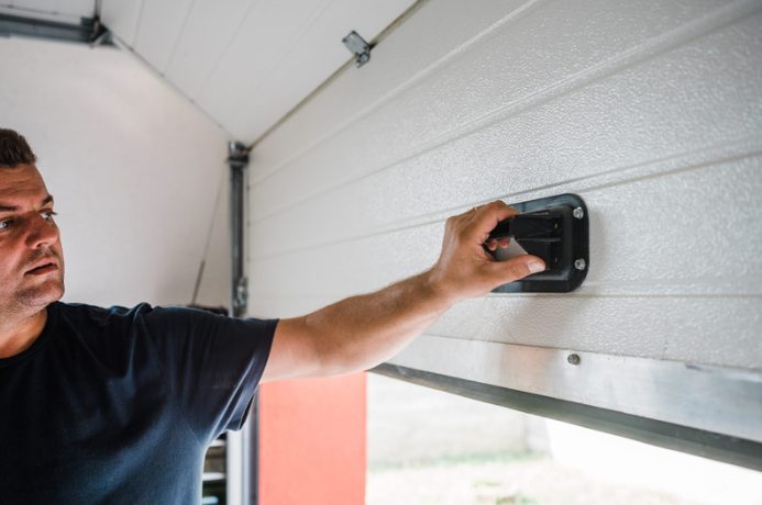 how to repair an uneven garage door